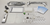 Collection of hardware components and tools on a gray surface