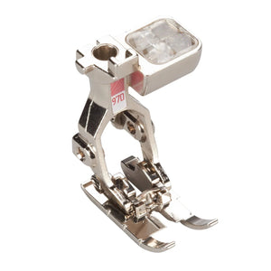 Sewing machine foot with brand logo on a white background Sewing machine foot with brand logo on a white background