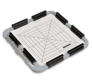 Quilting ruler with grid lines on a white background
