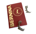 Red notebook with 'BERNINA' and 'Little Book of Feet' text, accompanied by metal sewing footplates on a white background.